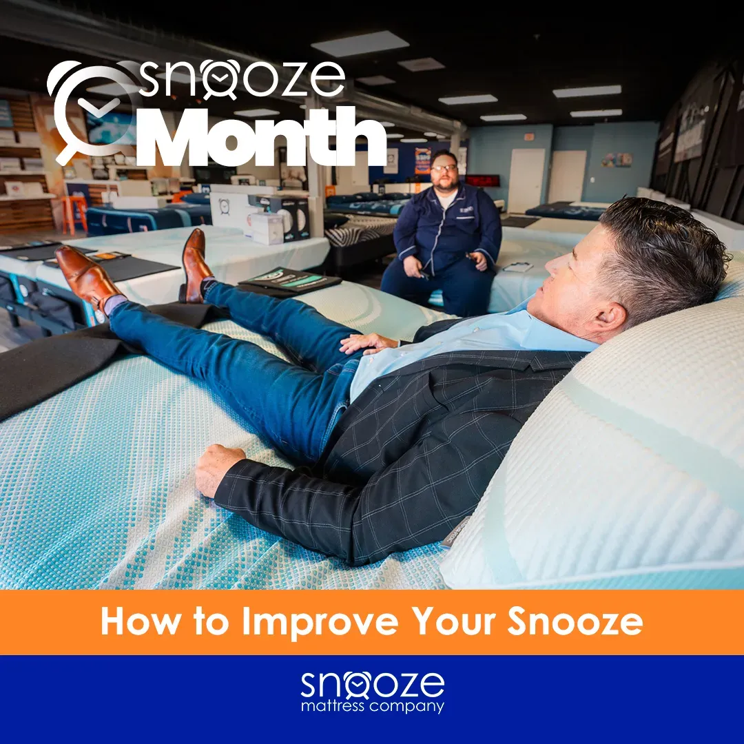 Man sitting back happily on bed